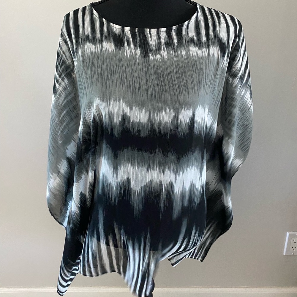 Loose sheer top.